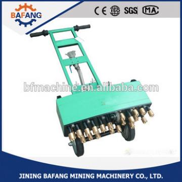 Multi headed concrete floor scabbler