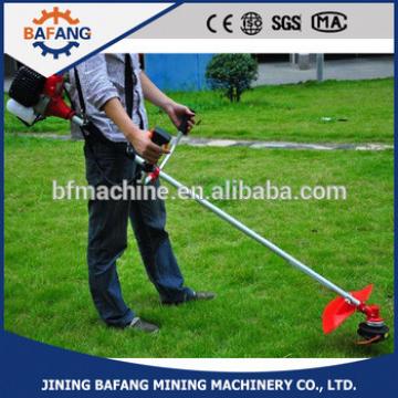 High Quality And Lowest Price 2 Stroke Side Hanging Petrol Bush cutter/ Grass Trimmer