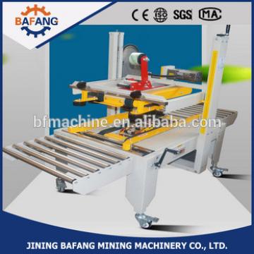 FXJ-6050 top &amp; bottom drive strapping machine